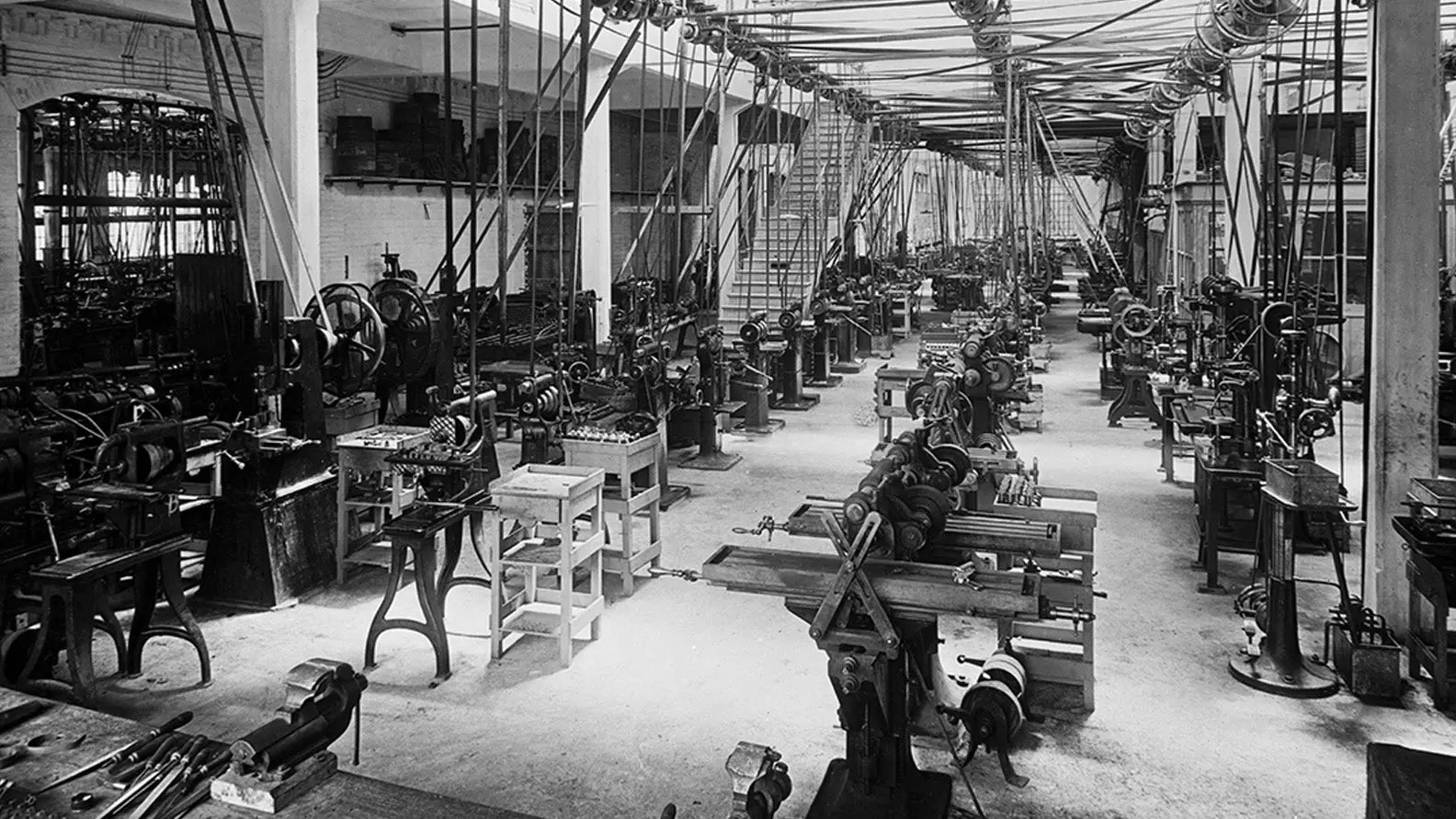 Factory floor with industrial machinery showcasing Beretta clothing and shooting clothing gear