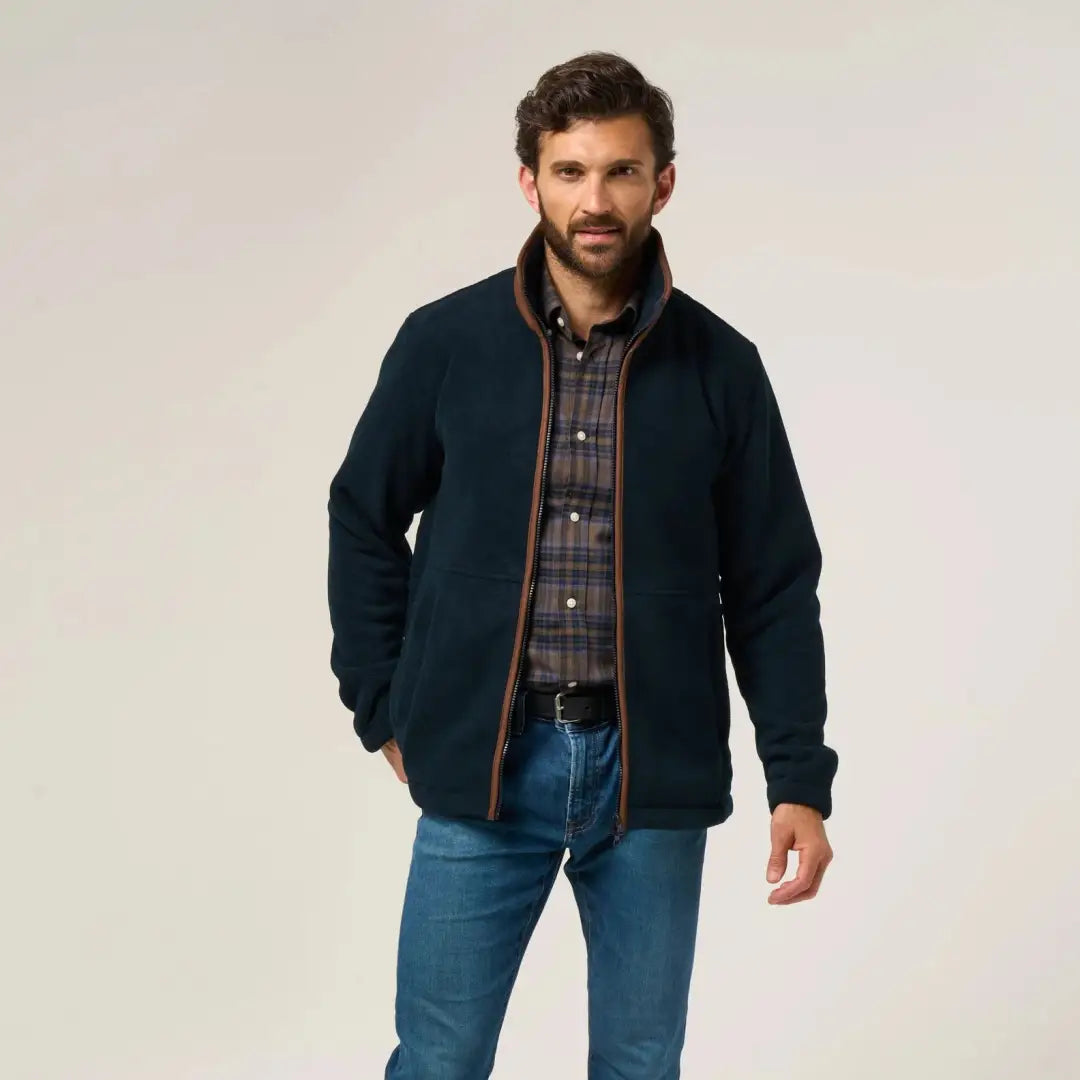 Men’s navy blue Alan Paine Aylsham fleece jacket with brown trim, a versatile option