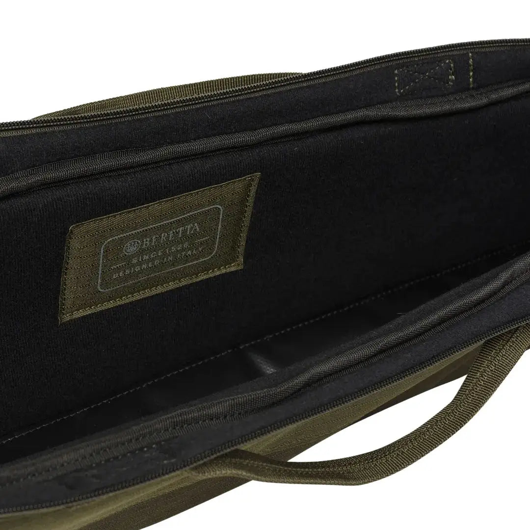 Open green and black gun case for various barrel lengths, perfect for country clothing users