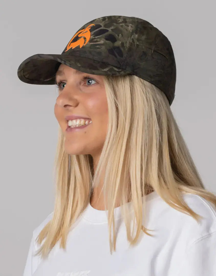 Bushbuck FoldIt Quick Dry Cap: camouflage cap with orange logo