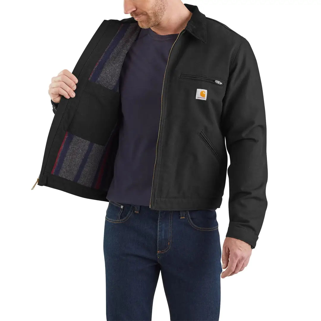 Black Carhartt relaxed fit Detroit jacket with patchwork and fleece lining