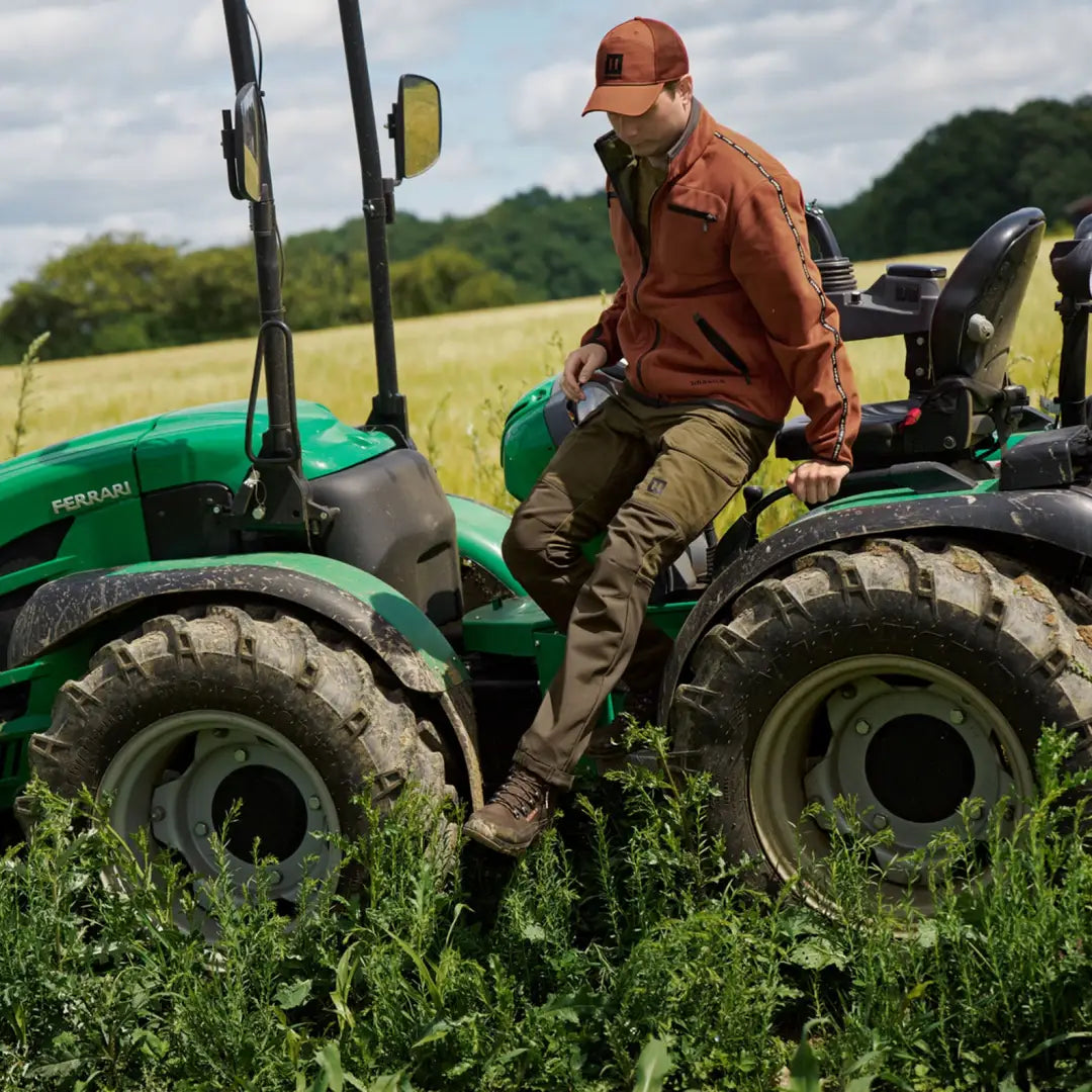 Green Ferrari tractor on Harkila Scandinavian Trousers, perfect for Scandinavian trousers combine
