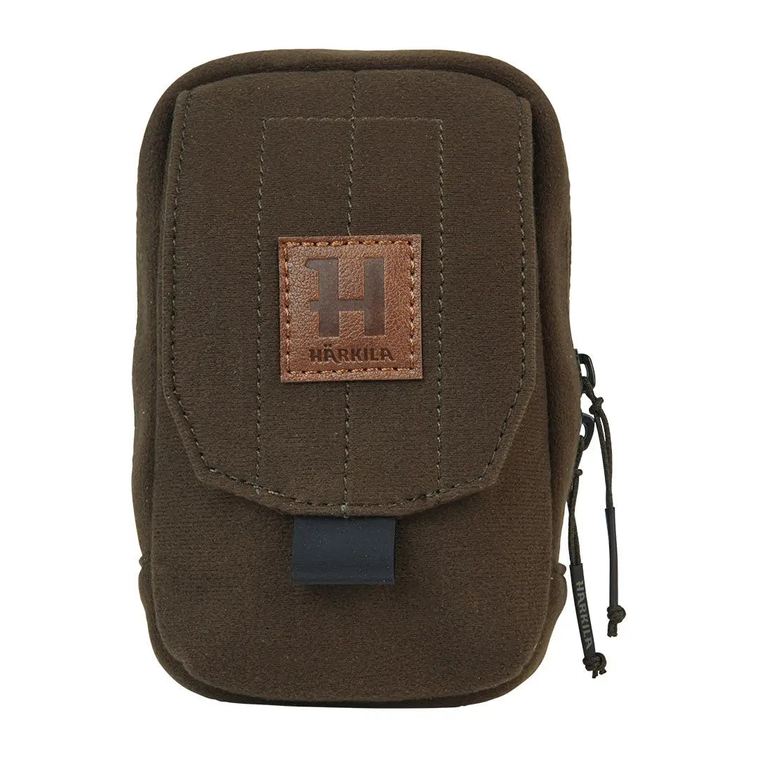 Brown canvas Harkila Utility Pouch with flap, perfect for country clothing and hunting gear