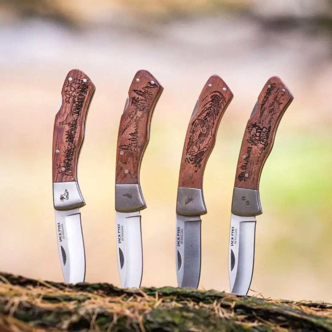 Four Jack Pyke Shires folding knives with wooden handles, feel confident using them