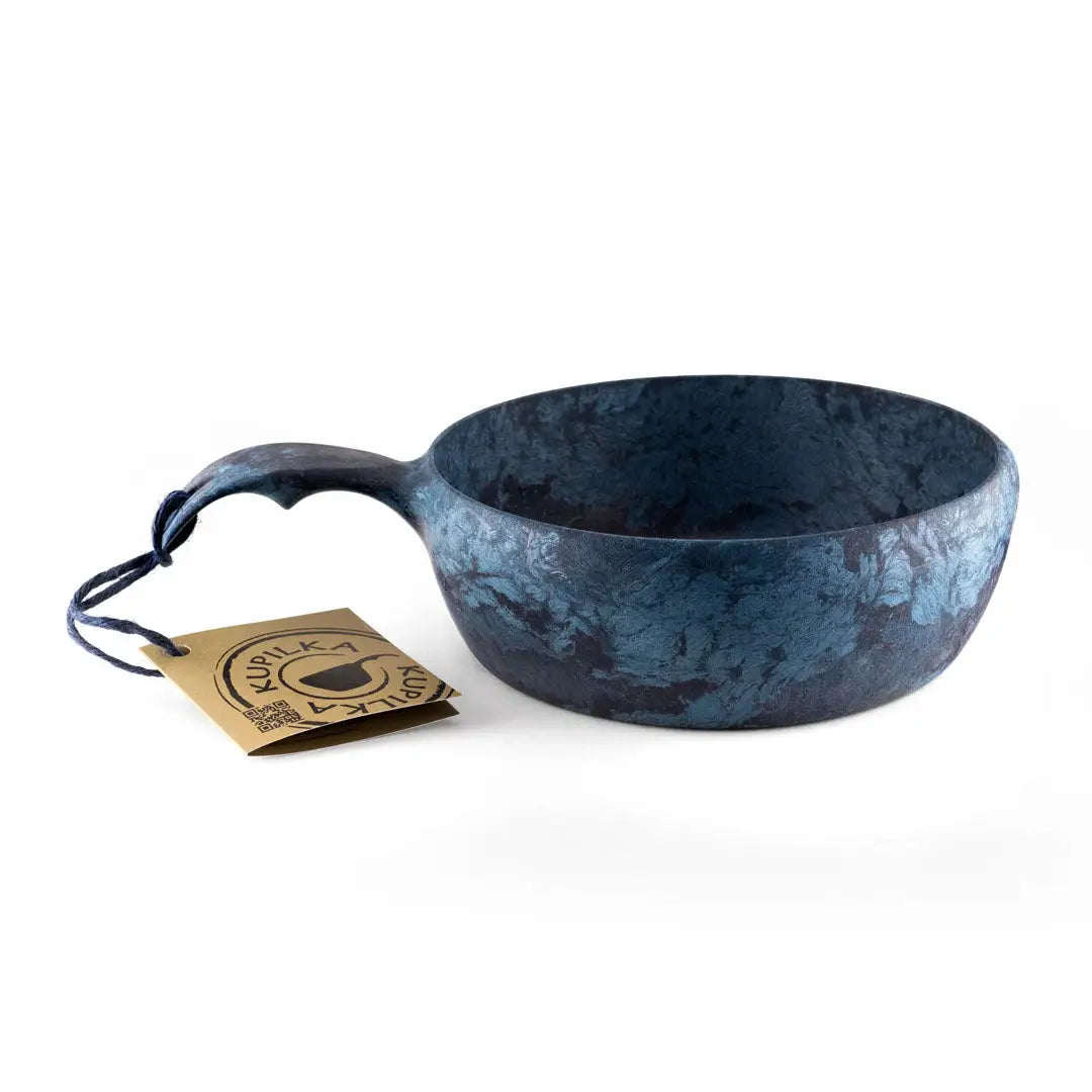 Blue and black Kupilka Bowl with tag, perfect for outdoor adventures with natural fibre composite