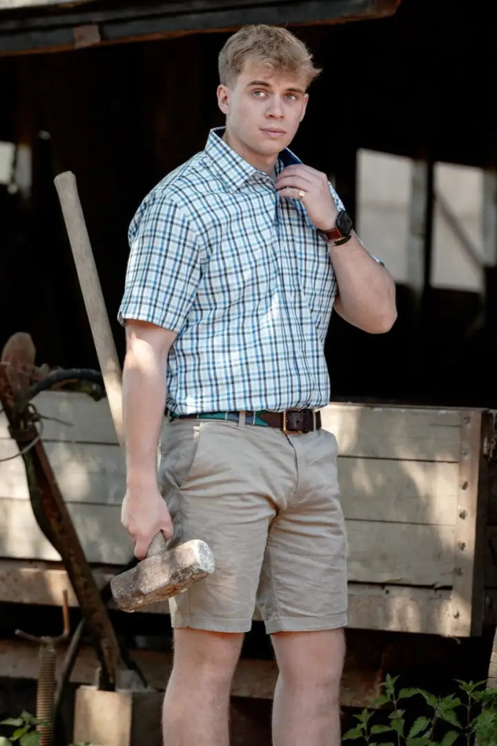 Man in plaid shirt and khaki shorts wearing New Forest Chino Shorts, perfect forest chino shorts style