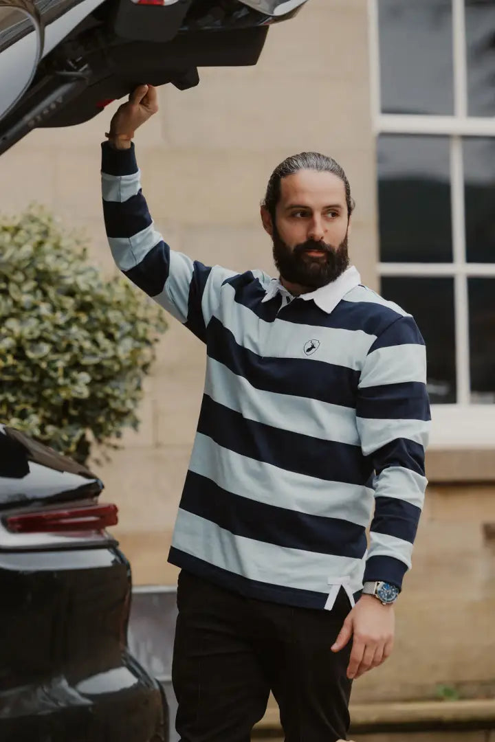 Man in striped rugby shirt showcasing the New Forest Classic Stripe Rugby Shirt