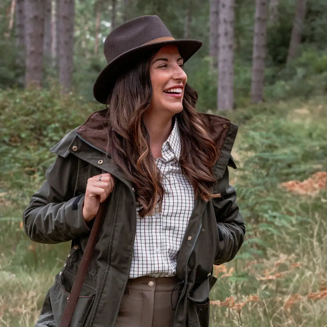 Woman in outdoor gear wearing the New Forest Ladies Marsh Jacket perfect for forest ladies