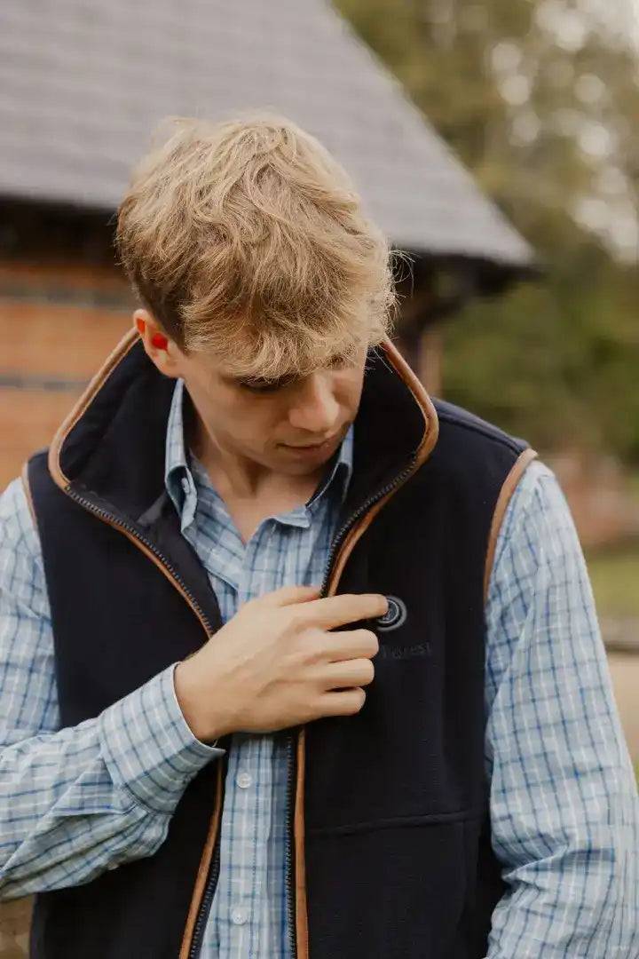 Navy fleece gilet with brown trim, perfect for cozy warmth in the New Forest