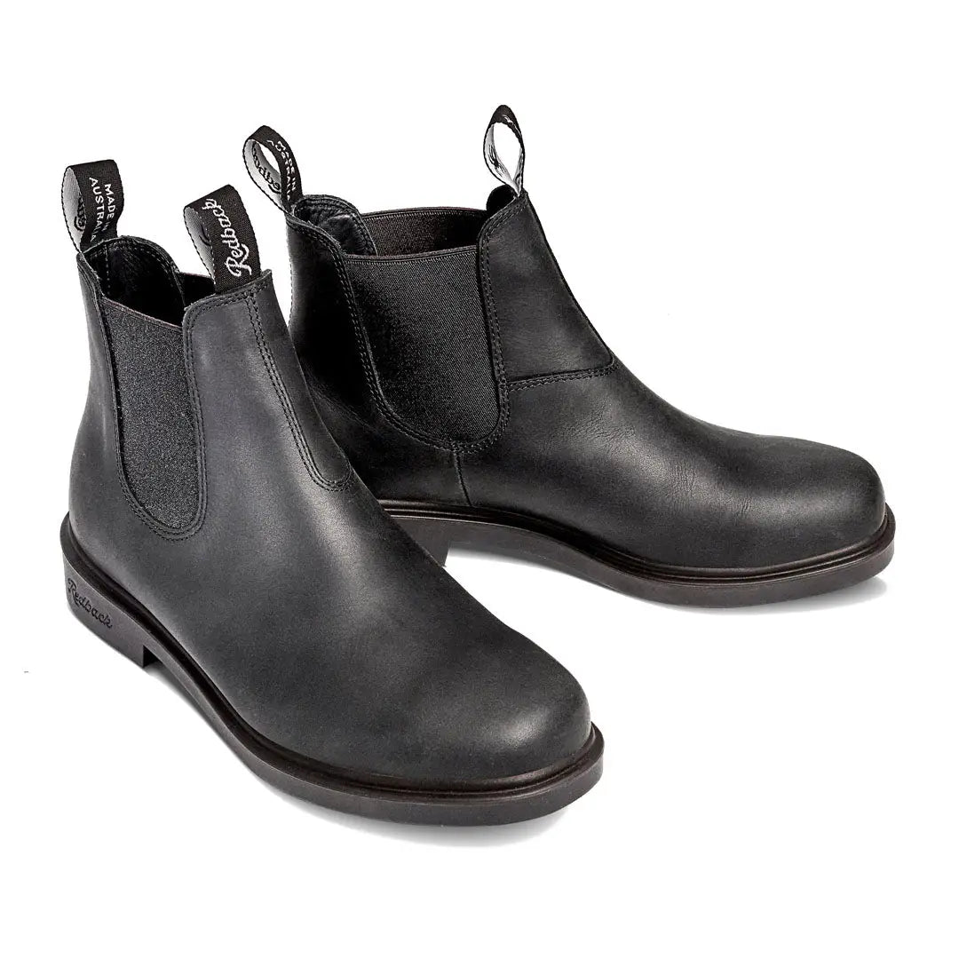 Black leather Chelsea boots with elastic panels and metal grommets from Redback Whistler Dress range