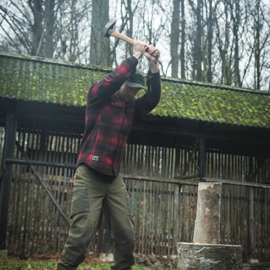 Man swinging hammer wearing the Seeland Canada Yukon Shirt in Yukon style