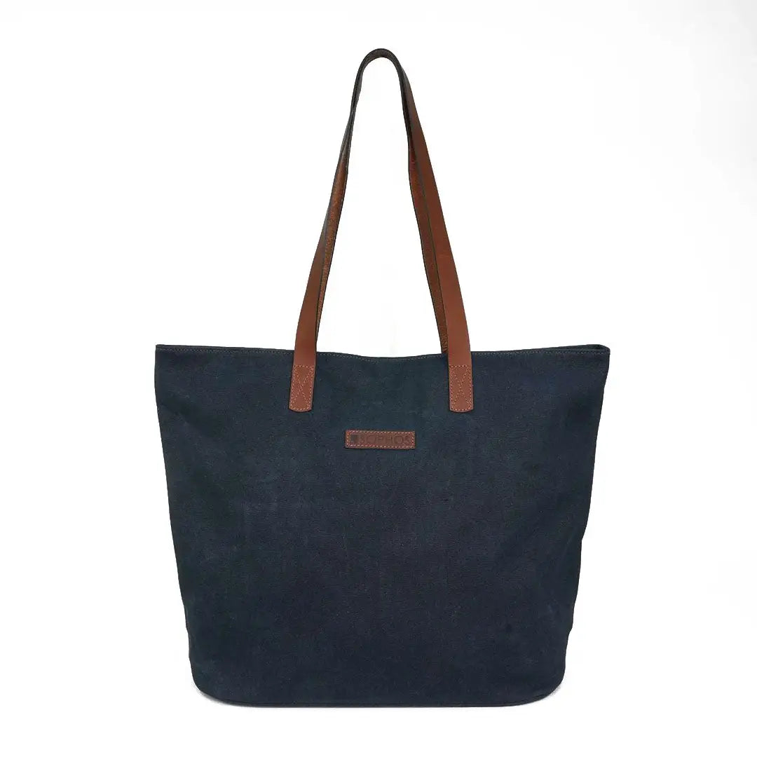 Sophos Canvas tote bag in navy blue with brown leather handles