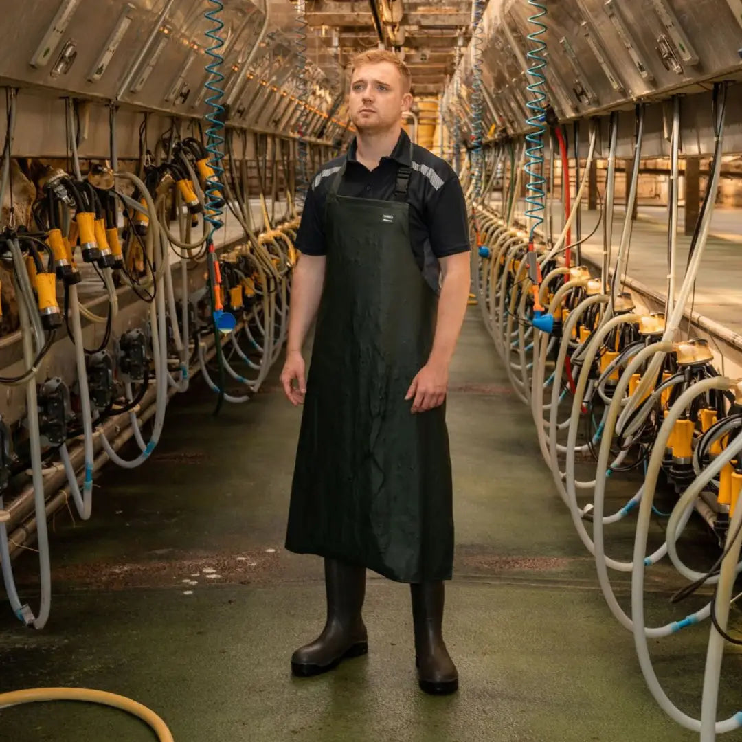 Man wearing Xpert Swampmaster Stormgear waterproof dairy apron for country clothing