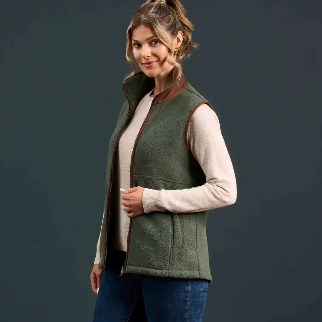 Women’s green fleece vest with brown trim from Alan Paine Aylsham for warmer days worn