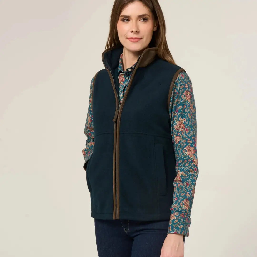 Woman in Alan Paine Aylsham Fleece Gilet for warmer days worn with layered outfit
