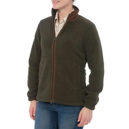 Women’s dark olive green Aylsham fleece jacket with brown collar over plaid shirt and jeans