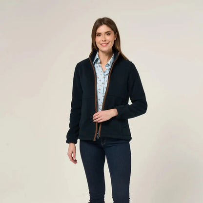 Woman wearing Alan Paine Aylsham versatile fleece jacket with light blue shirt and jeans