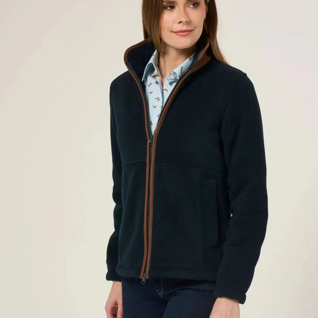 Women’s navy blue fleece jacket with brown zipper and collar, perfect versatile fleece jacket