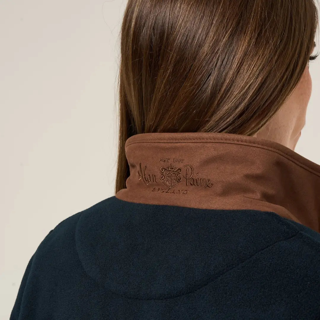 Woman wearing Alan Paine Aylsham versatile fleece jacket with brown collar