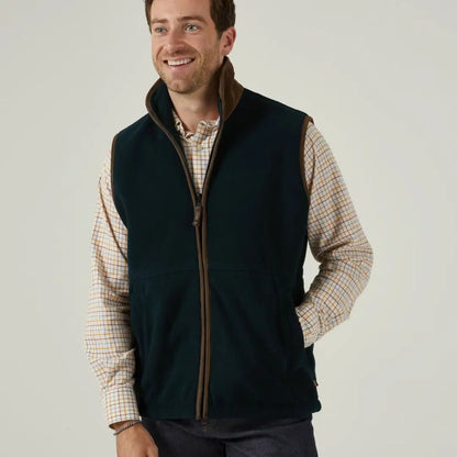 Men’s dark green fleece vest with brown trim from Alan Paine Aylsham, a versatile piece