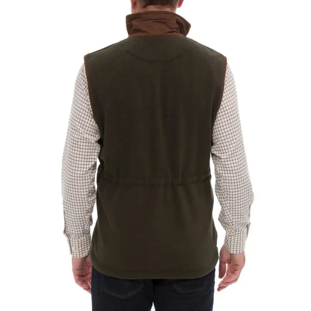 Alan Paine Aylsham men’s dark green quilted vest with brown collar over checkered shirt