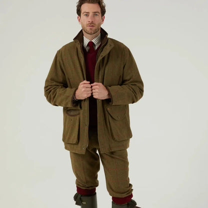 Men’s olive green quilted field coat from Alan Paine Combrook with matching trousers and boots