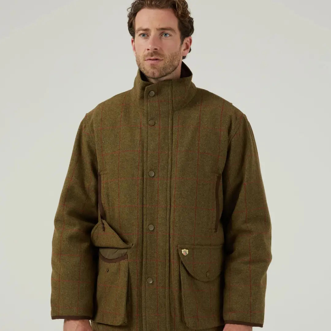 Men’s olive green tweed field coat with multiple pockets from Alan Paine Combrook