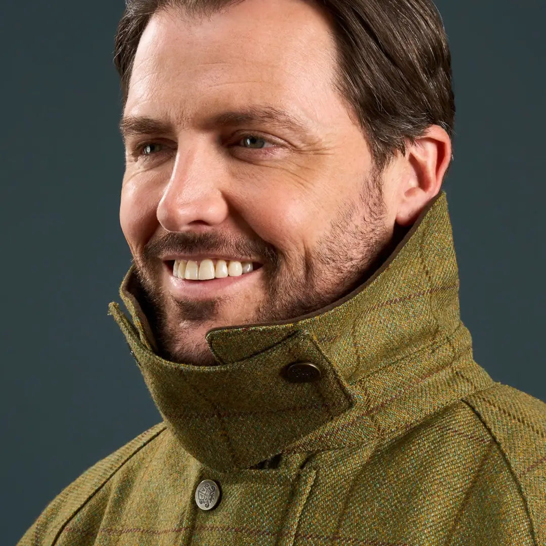 Man smiling in Alan Paine Country Wear Collection Rutland waterproof tweed coat