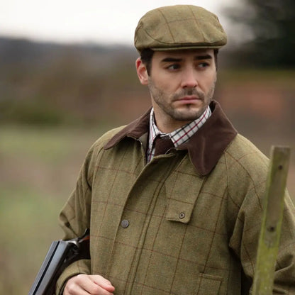 Alan Paine country wear collection man in durable wool blend green tweed coat