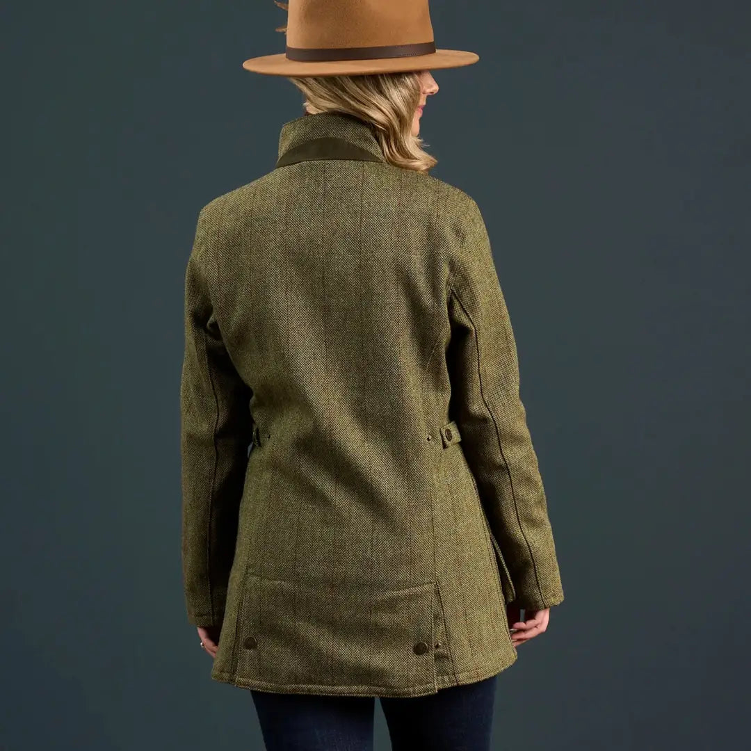 Woman in brown fedora and green tweed jacket wearing alan paine rutland coat