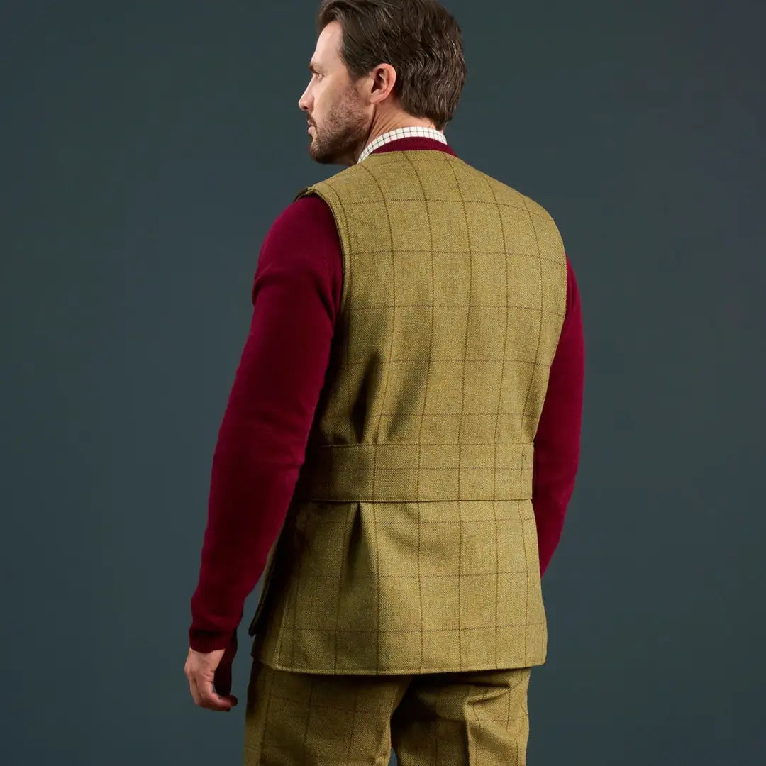 Alan Paine Rutland men’s olive green tweed shooting waistcoat over a maroon jumper
