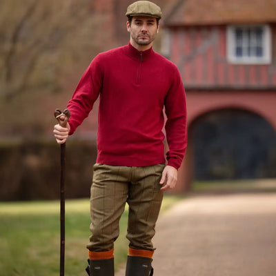 Men’s red quarter-zip sweater with high collar paired with Alan Paine Rutland Tweed Breeks