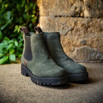 Rugged green suede Chelsea boots with rubber soles, perfect for country clothing and hunting