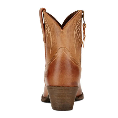 Tan leather pointed toe cowboy boots for stylish country clothing and outdoor adventures