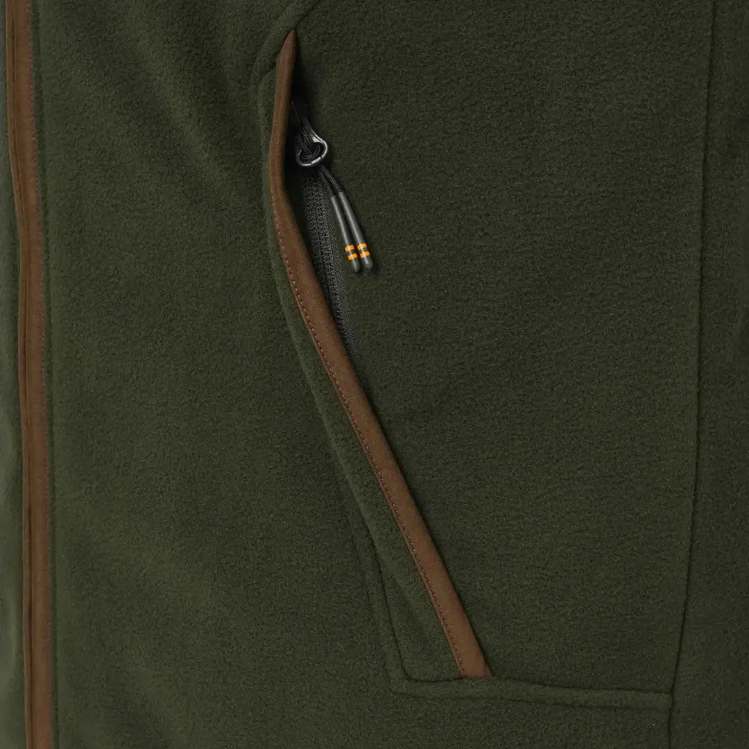 Green fleece jacket pocket on Beretta Arlington Vest perfect for country hunting outdoors
