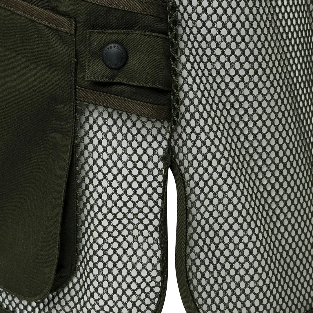 Olive green mesh panel shorts on Beretta mesh shooting vest
