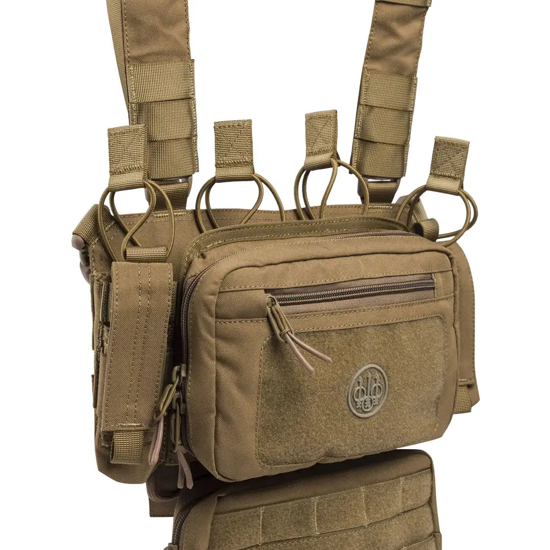 Tan tactical chest rig with multiple pouches and adjustable straps for tactical chest gear