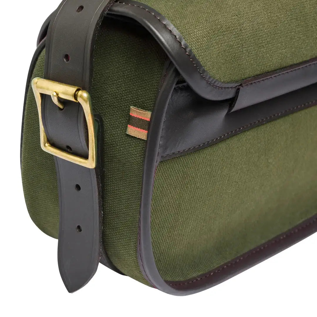 Olive green canvas hunting bag with leather trim for country clothing and outdoors adventures