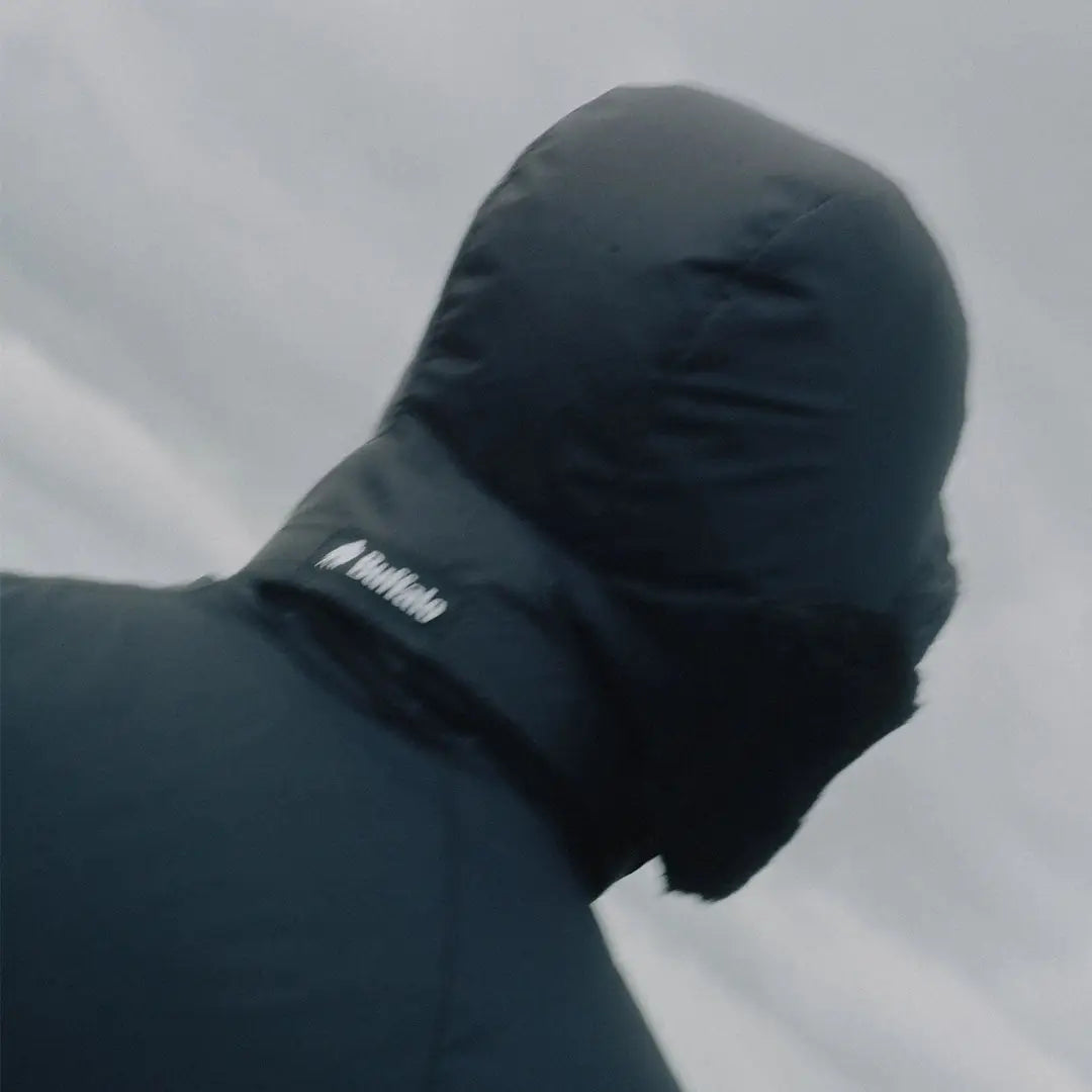 Person in a buffalo dp hood jacket with aquatherm pile lining for warmth