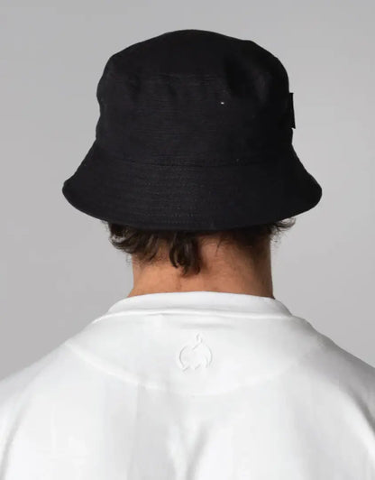 Bushbuck Canvas Bucket Hat in black with wide brim and strap