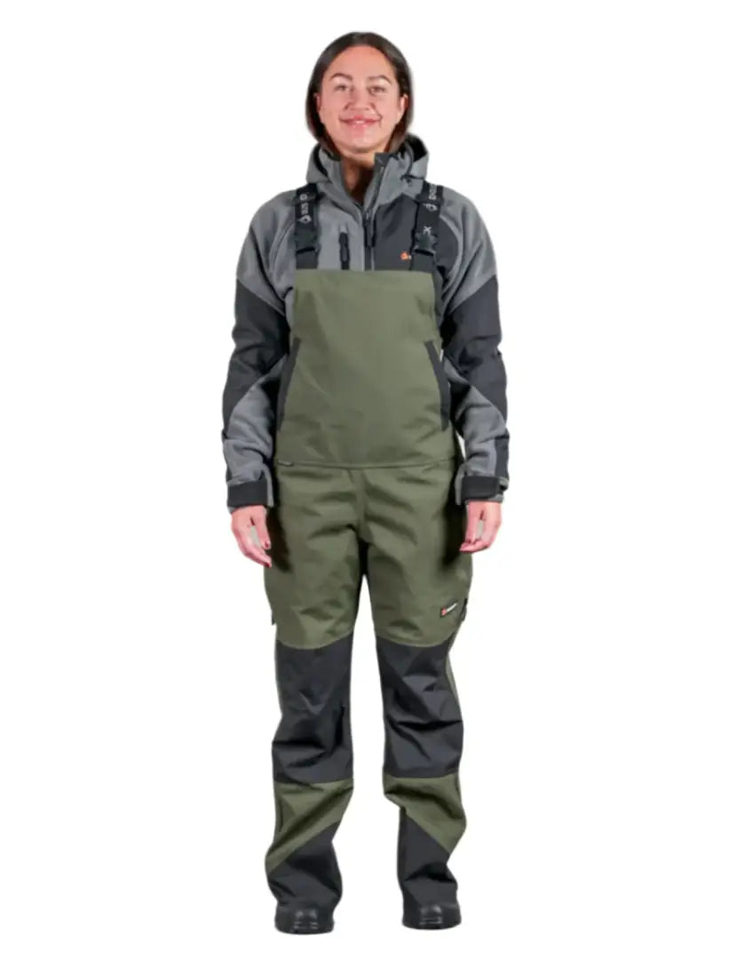 Olive green Bushbuck Defender waterproof bib overalls with gray defender jacket for outdoor gear