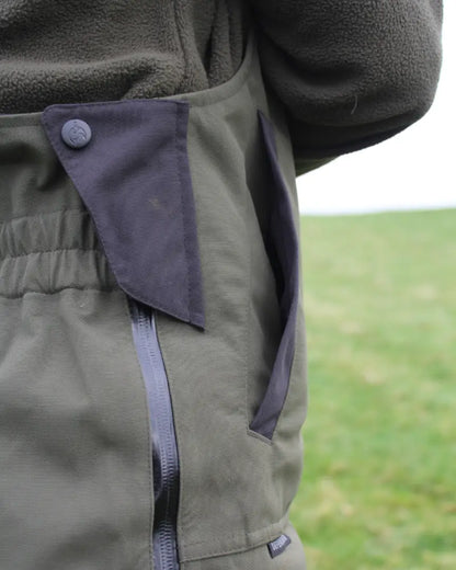 Olive green Bushbuck Defender waterproof bib overtrousers with pockets for hunting