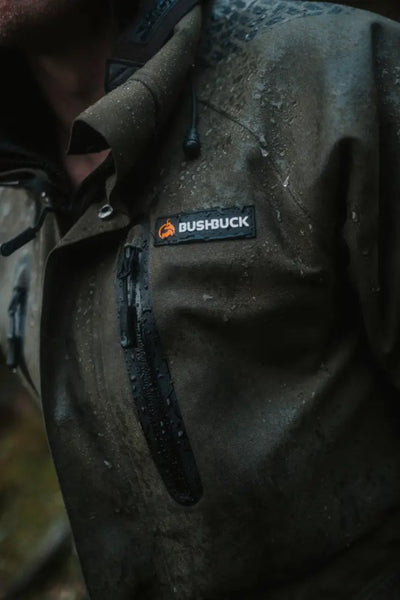 Water-resistant olive green Bushbuck Defender Waterproof Jacket perfect for country clothing and hunting adventures