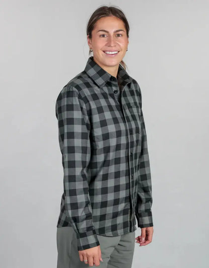 Woman wearing Bushbuck Flannel Shirt with gray and black plaid design, perfect flannel shirt style