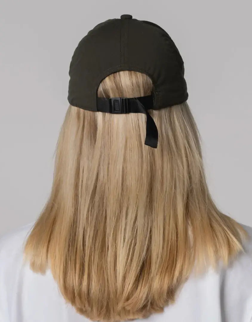 Bushbuck FoldIt Quick Dry Cap: black baseball hat with adjustable strap and curved brim