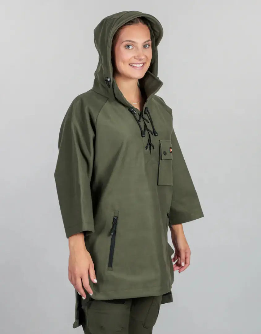 Olive green hooded poncho from Bushbuck Huntsman Bushshirt for outdoor adventures