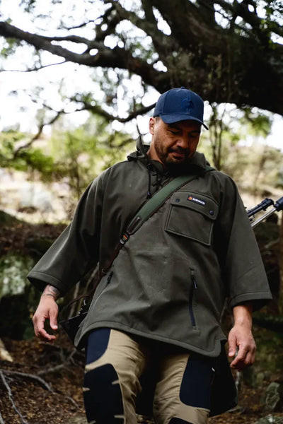 Hunter wearing a bushbuck huntsman bushshirt with poncho outdoor style cool look