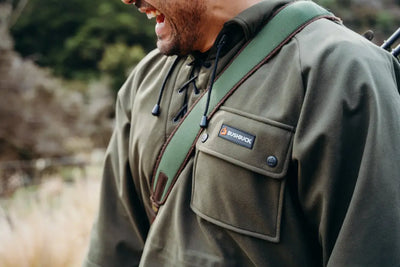 Green hooded poncho with pocket from Bushbuck Huntsman Bushshirt for outdoor adventures