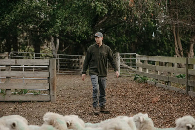 Man wearing Bushbuck Vertex Half Zip Fleece outdoor clothing for hiking and adventure