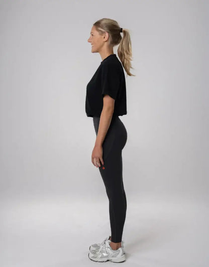 Bushbuck Womens Ascent Leggings: black with silver sneakers, ponytail for hunting outdoors